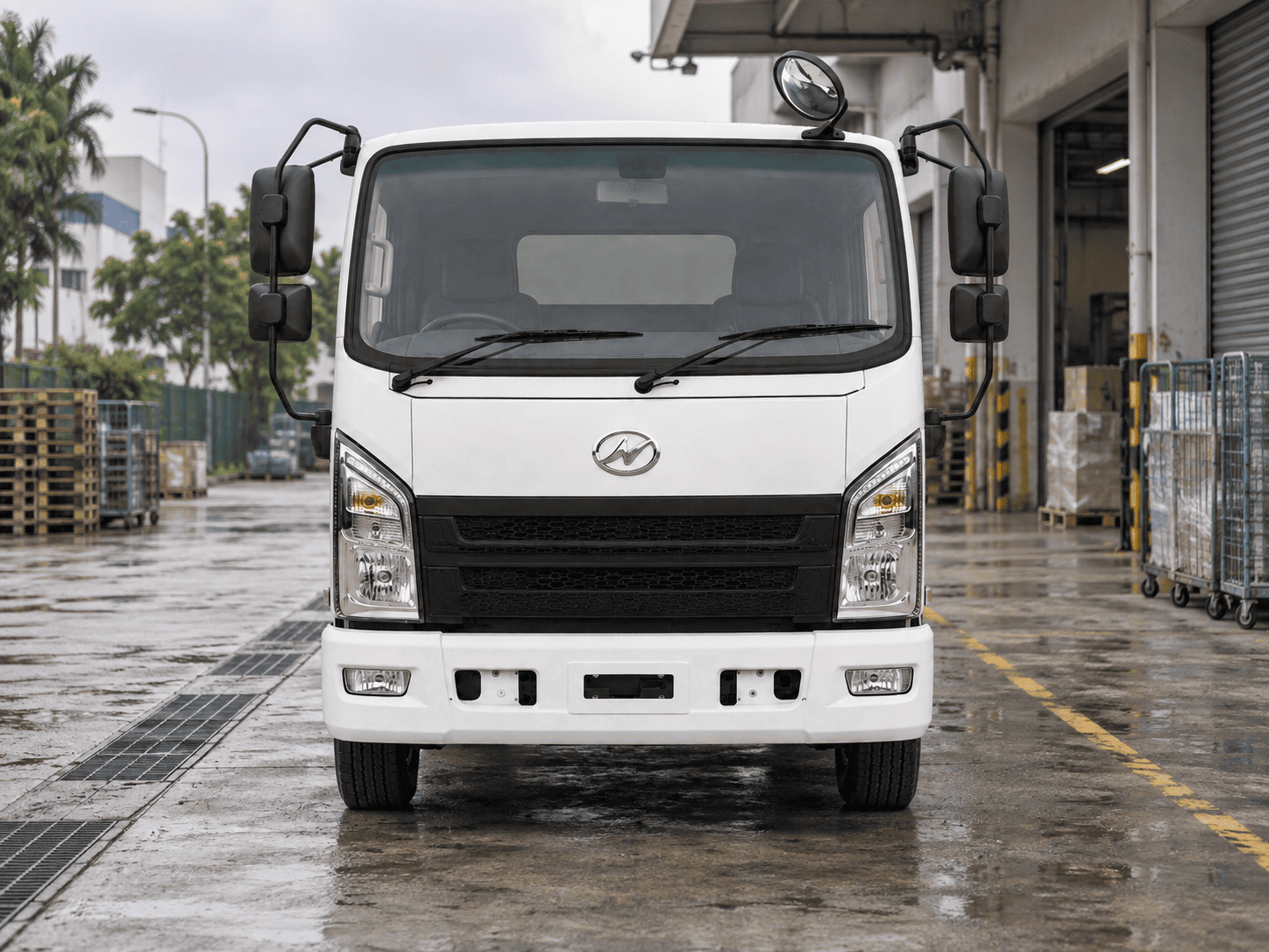 Higer EV H6T electric truck front view at a Singapore warehouse